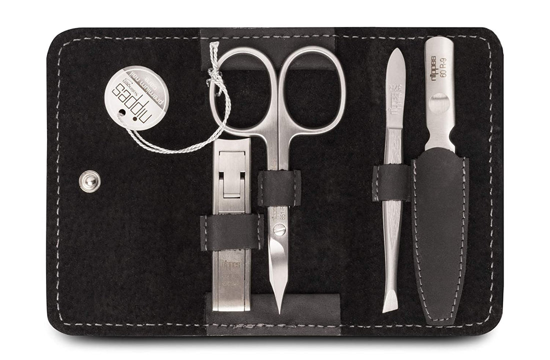 1028 Manik re-Set, Falt-Leder Etui mit Druckverschluss schwarz 4-tlg.
