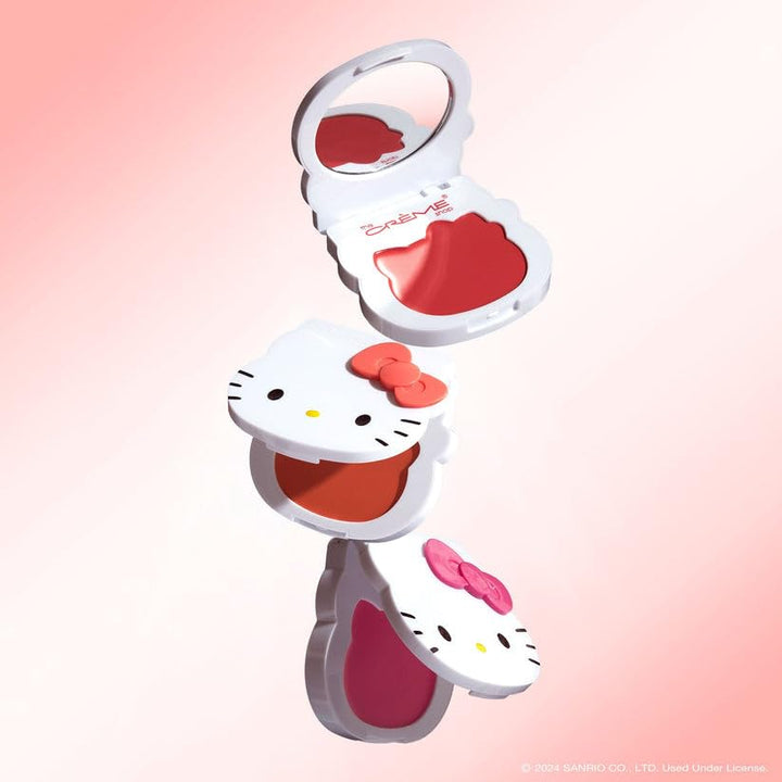 The Crème Shop x Hello Kitty - Crème Blush Balm Peach Pouf Buildable Long-lasting Easily Blendable Hydrating & Soothing Aloe Vera Compact Mirror. Elevate Your Makeup Game - Berry Cute (Set of 1)