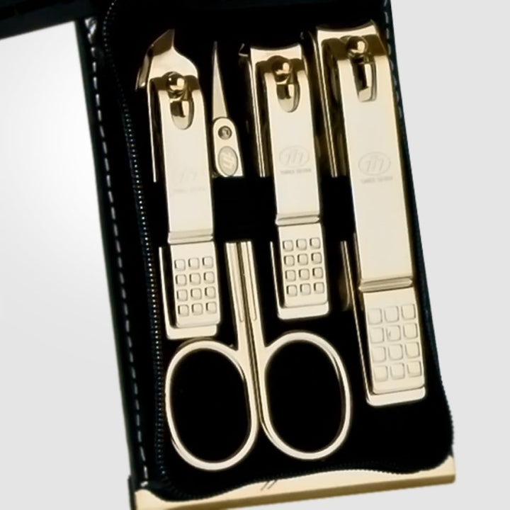 World No. 1. Three Seven (777) Travel Manicure Pedicure Grooming Kit Set - Included (Total 9 PCs: Nail Clipper, Toe Nail Clipper, Cuticle Trimmer, Beauty Scissors, Tweezers, File, Double-sided Push Stick, V-Shaped Push Stick, Ear Pick, Model: TS-970B