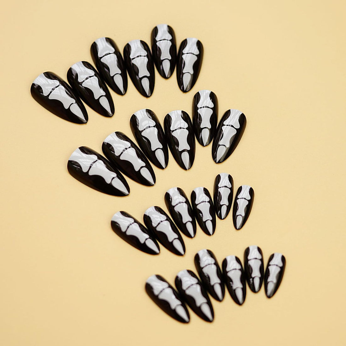 24 Pcs Almond Press on Nails Long Stiletto Fake Nails with Glue Black False Nails with Skeleton Palm Design Acrylic Nails Press ons Halloween Glue on Nails Artificial Stick on Nails for Women Girls