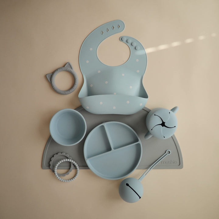 mushie Silicone Baby Bib | Adjustable Fit Waterproof Bibs (White Daisy)