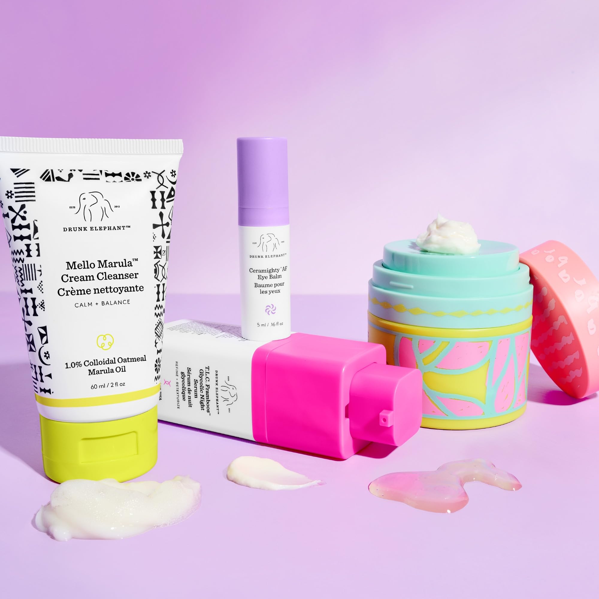 Drunk Elephant Opening Night Kit - Bora Barrier Cream (50ml/1.69 fl oz), Mello Marula Cream Cleanser (60ml/2 fl oz), TLC Framboos Glycolic Night Serum (15ml/.5 oz), Ceramighty Cream (5ml/.16 fl oz)