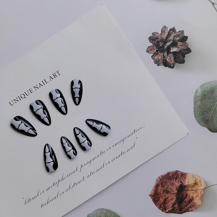 24 Pcs Almond Press on Nails Long Stiletto Fake Nails with Glue Black False Nails with Skeleton Palm Design Acrylic Nails Press ons Halloween Glue on Nails Artificial Stick on Nails for Women Girls