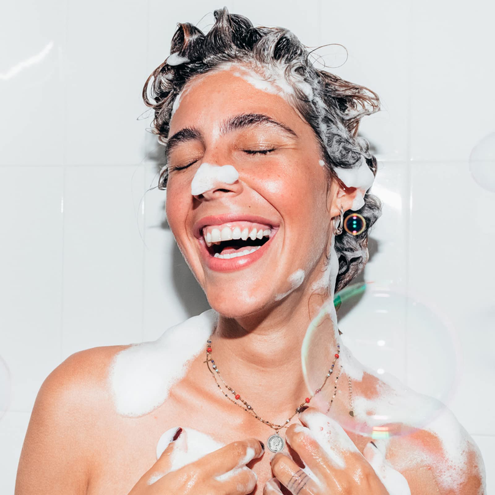 RAW SUGAR Volume Revive Shampoo. Antioxidants + Hyaluronic Acid. Strawberry + White Tea + Nettle. 18 Fl Oz Bottle