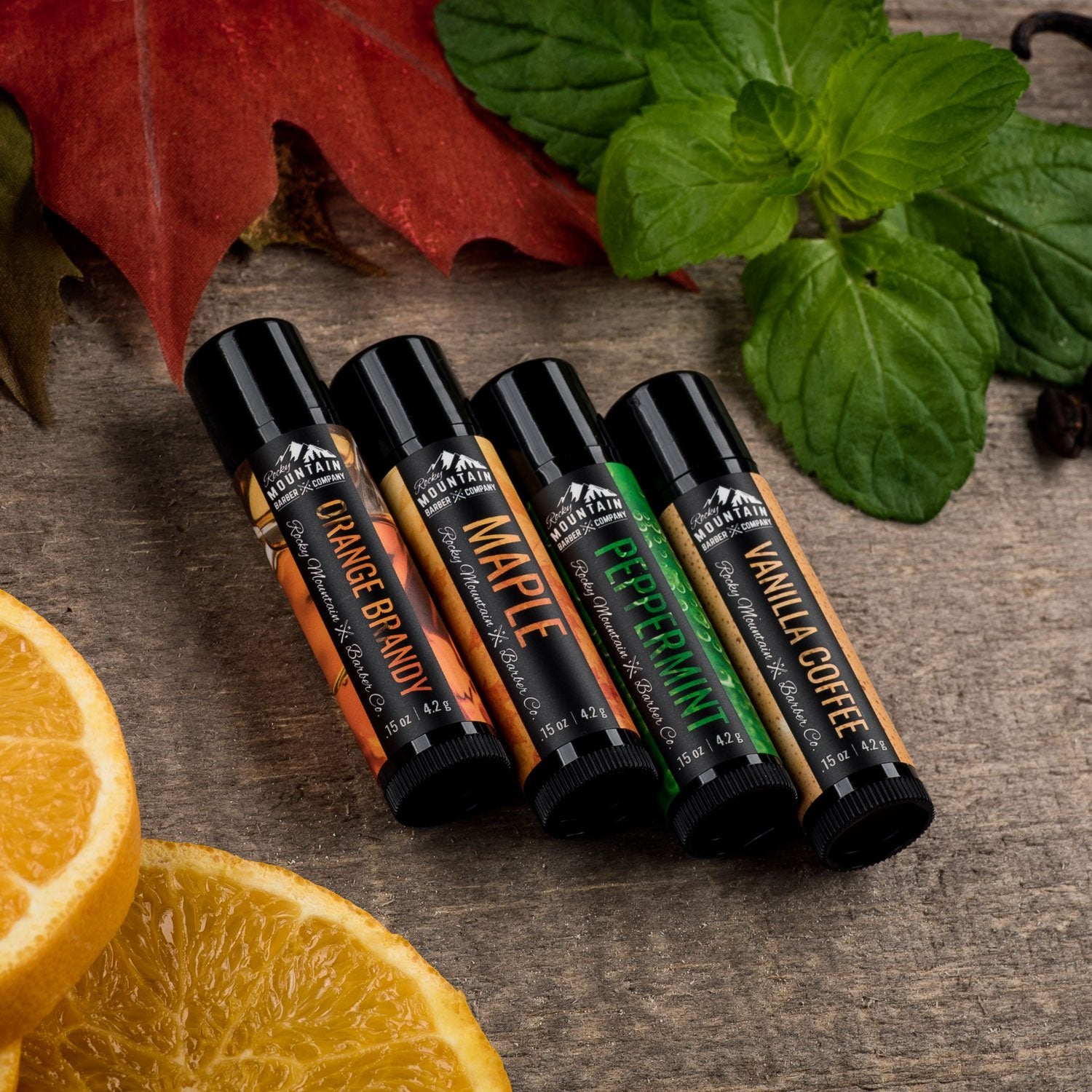 Lip Balm Set - 4 Scents - Maple, Vanilla, Peppermint, Orange Brandy - No Shine Matte Finish - Natural Ingredients Include Coconut Oil, Avocado Oil, Bees Wax, Shea Butter