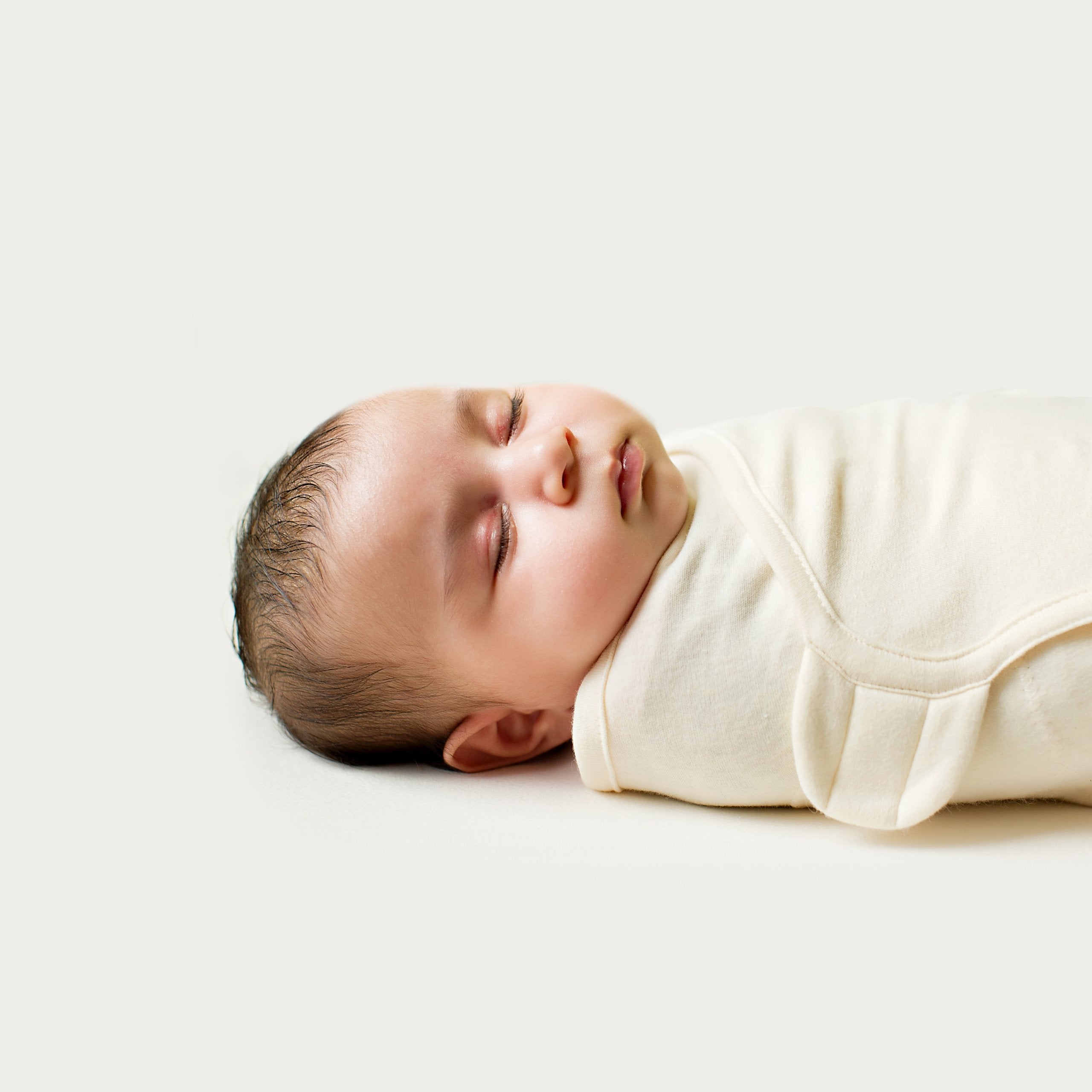 SwaddleMe by Ingenuity Original Swaddle, 100% Cotton, Improves Sleep & Calms Startle Reflex, Preemie Size, Up to 7 Pounds, 1-Pack, Baby Swaddle Blanket - Cream