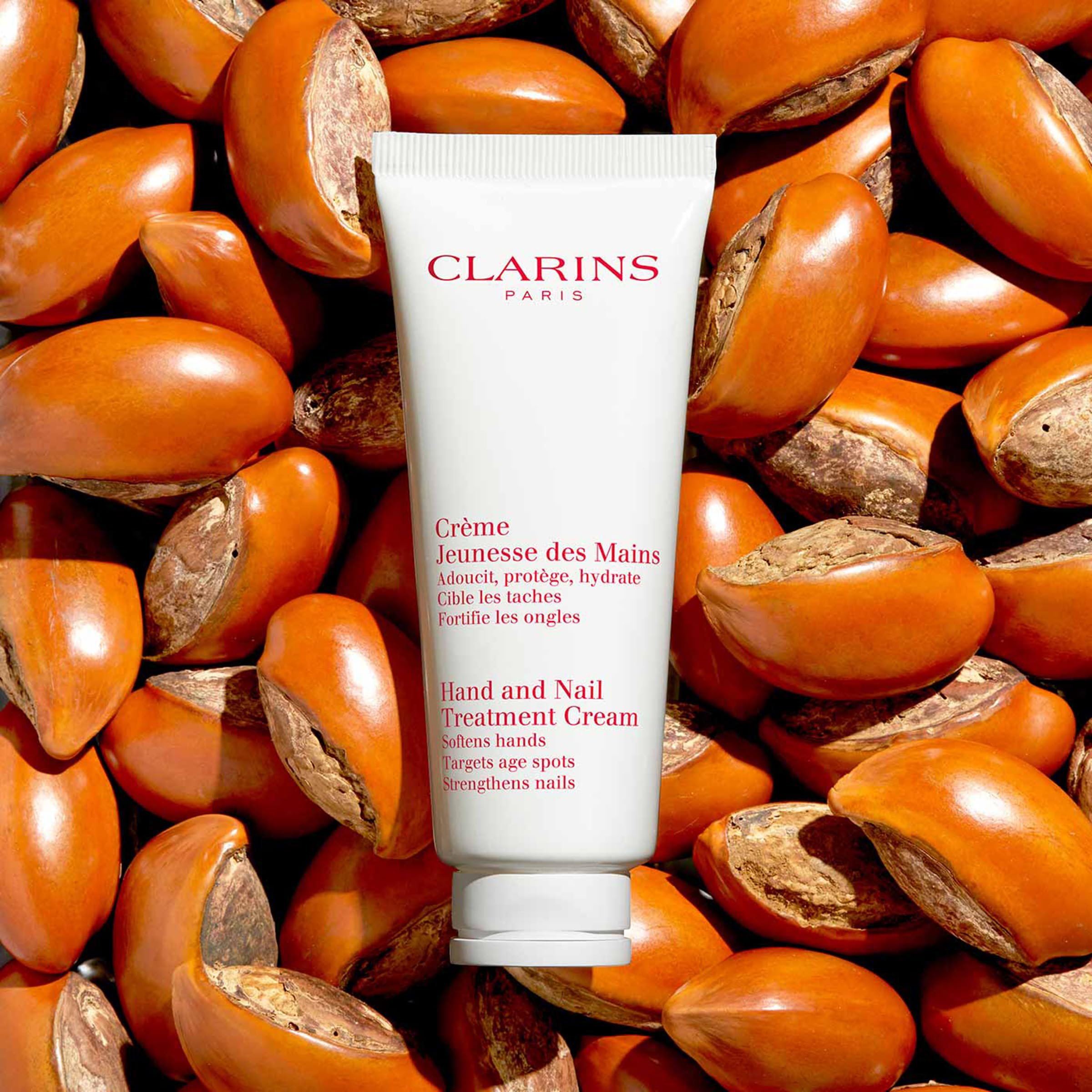 Clarins Hand and Nail Treatment Cream | Award-Winning | Softens, Nourishes and Shields Skin | Strengthens Nails and Conditions Cuticles | Natural Plant Extracts, Including Shea Butter | 3.4 Ounces