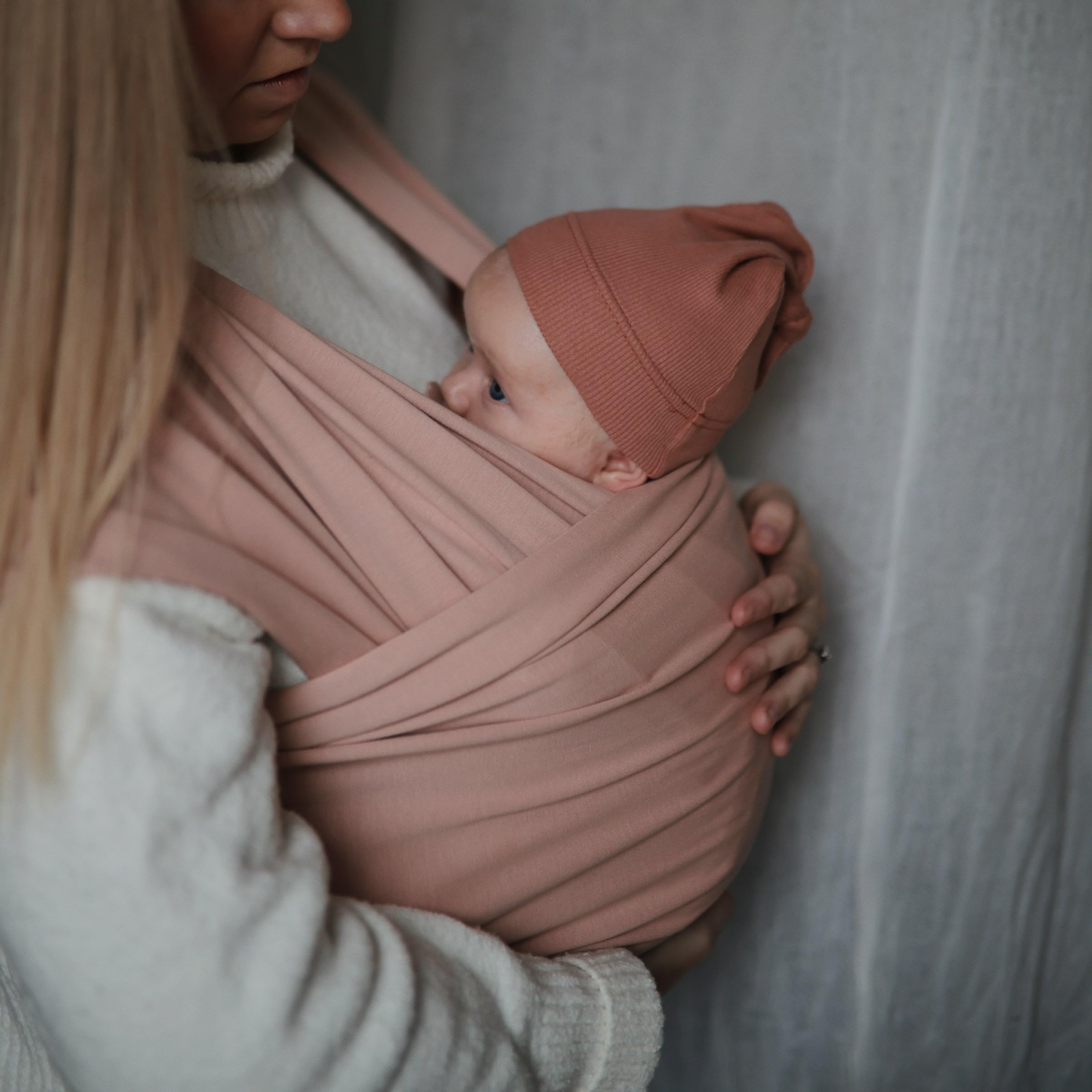 mushie Baby Wrap Carrier | Organic Cotton and Elastane | Infant Sling for Newborn and Babies 8-35 lbs (Blush)