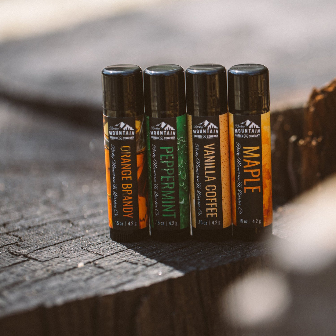 Lip Balm Set - 4 Scents - Maple, Vanilla, Peppermint, Orange Brandy - No Shine Matte Finish - Natural Ingredients Include Coconut Oil, Avocado Oil, Bees Wax, Shea Butter