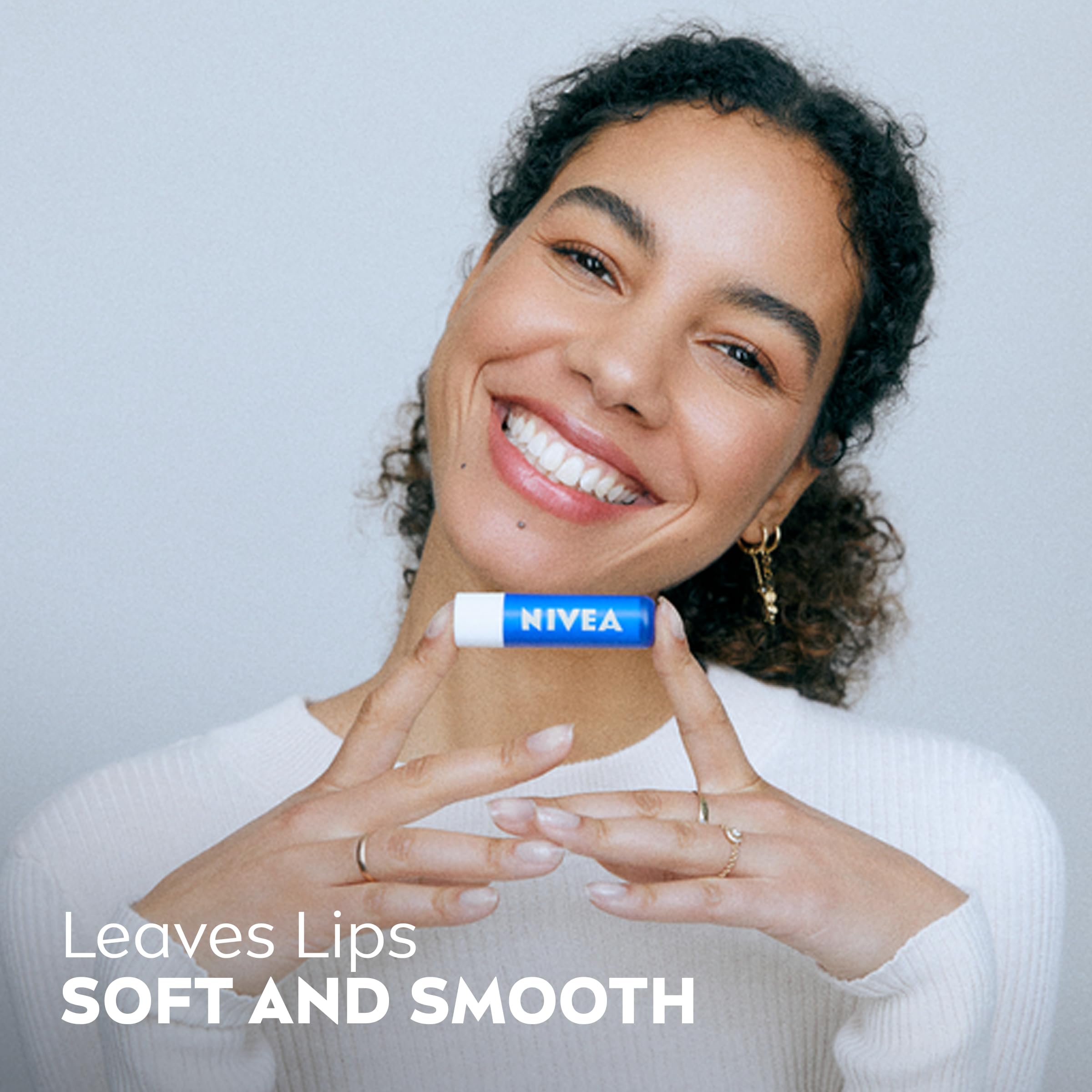 NIVEA Nourishing Moisture Collection Skin Care Set, Nourishing Care Body Wash, 20 Fl Oz Bottle + Body Lotion, 13.5 Fl Oz Bottle + Hand Cream, 2.6 Oz Tube + Moisture Lip Care Balm, 0.17 Oz Stick