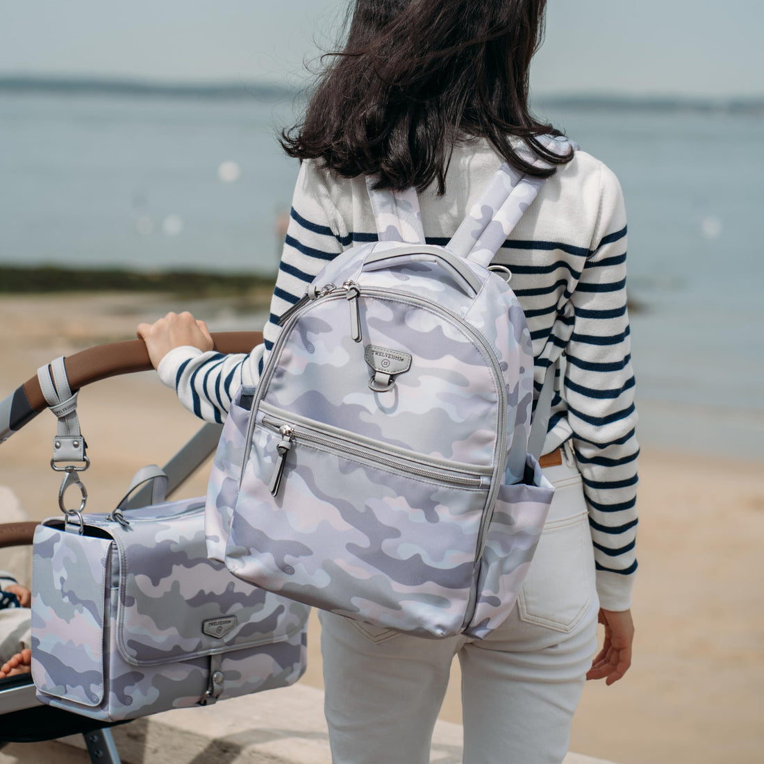TWELVElittle Midi Go Diaperbag Backpack with Changing Pad, Diaper Bag Backpack for Moms or Dads with Insulated Pockets in Blush Camo