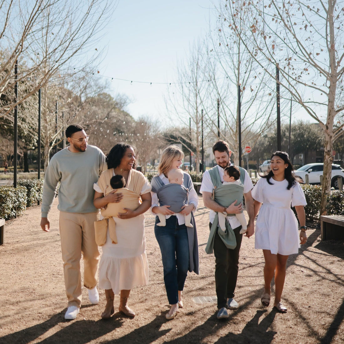 mushie Baby Wrap Carrier | Organic Cotton and Elastane | Infant Sling for Newborn and Babies 8-35 lbs (Blush)