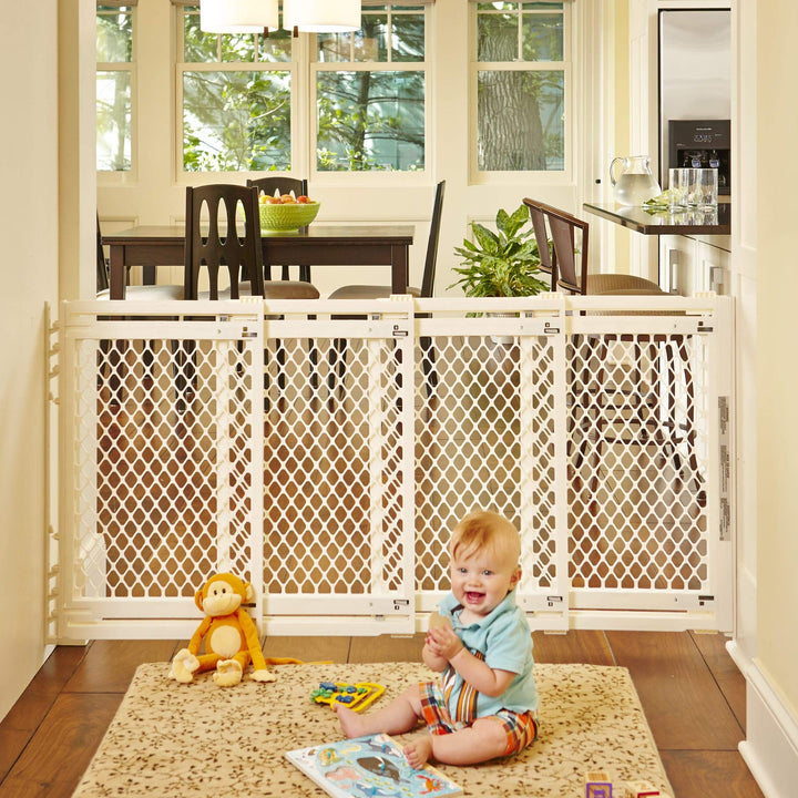 North States MyPet Extra Wide Pet Gate: Smoothly Opens in Extra Wide Spaces. Fits 22 - 62 Wide. Hardware Mount. Made in USA. 31 Tall, Ivory