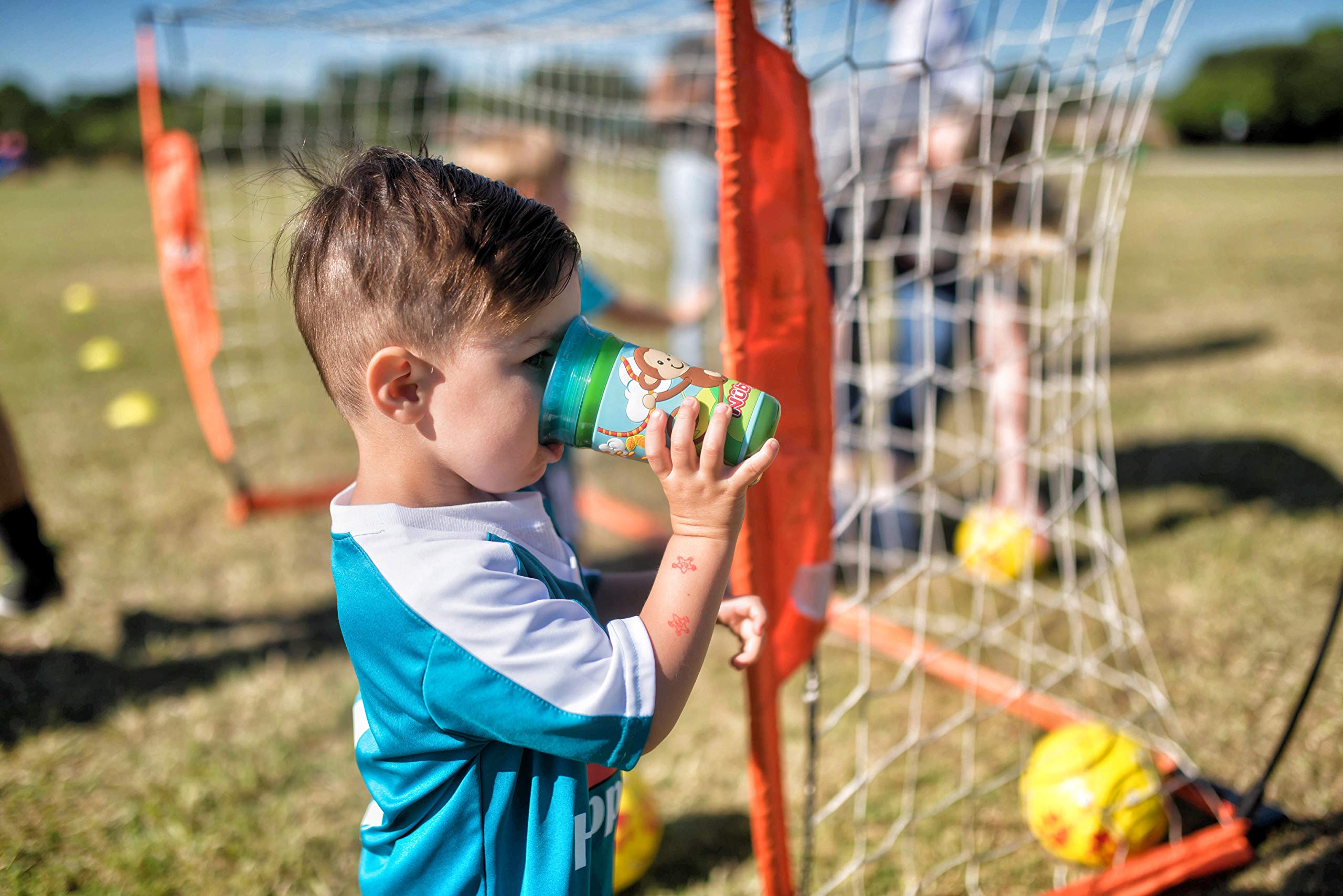 Nuby 360 Degree Easy Sip 3D Grip Wonder Cup with Printed Silicone Sleeve, 10 Oz, Whale